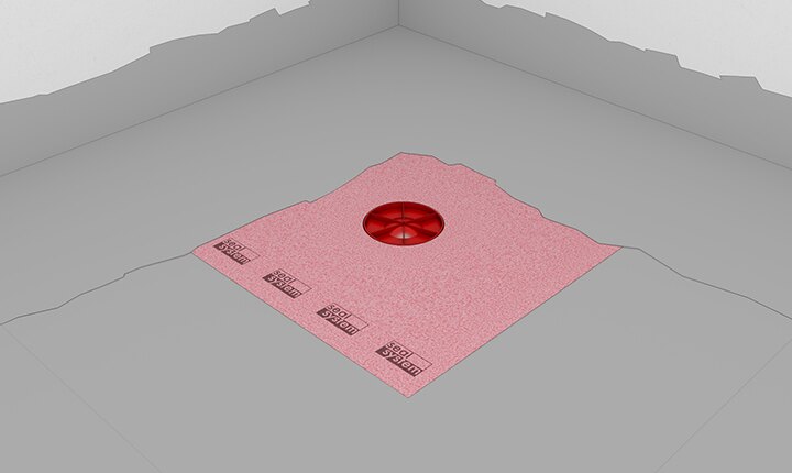 Montageschritt 4 TECEdrainpoint S: Die Seal System-Dichtmanschette wird in die erste, noch feuchte Schicht Verbundabdichtung eingearbeitet und mit der zweiten Schicht überarbeitet.