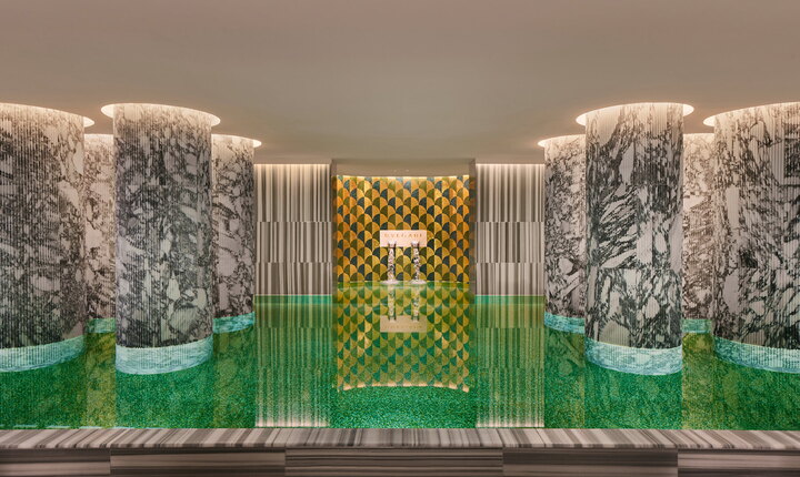 The "Temple of Wellbeing" is reminiscent of the atmosphere of ancient Roman baths, with marble columns protruding from the swimming pool and coloured glass bathing the room in soft light. (Published in association with Sleepifier: Bulgari Rome - Sleepifier)