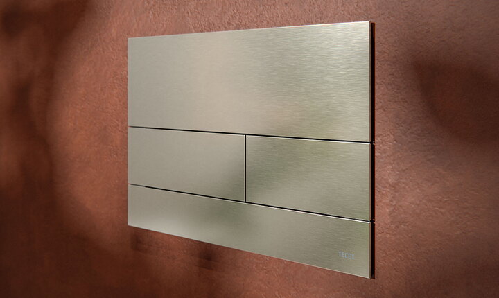 Spolknapen TECEsquare i borstad cool nickel