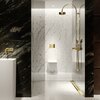 The TECEdrainprofile Gold Optic shower channel is available in a polished or brushed version.